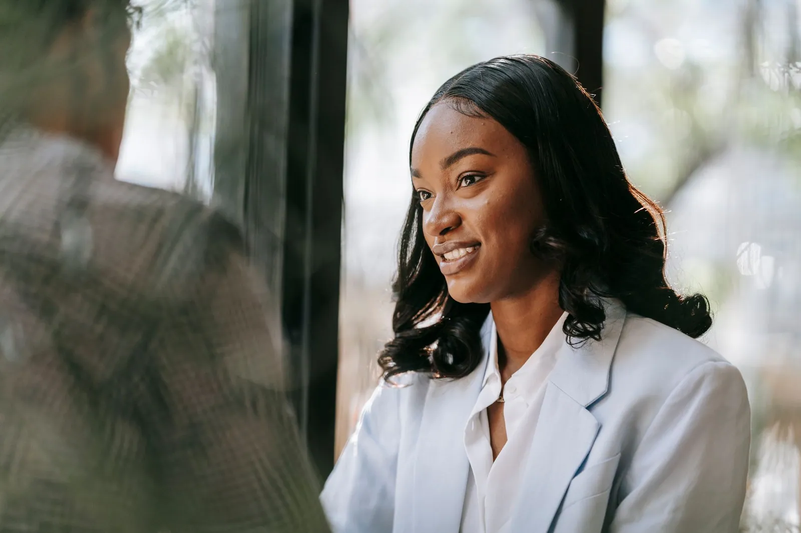 A coach and client in conversation